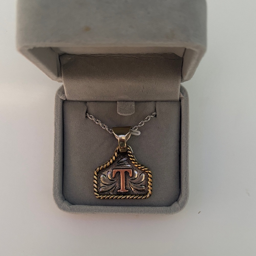 Vintage-Inspired Gold and Silver Pendant Necklace